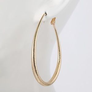 Urban Ruffle Jewelry - Textured Teardrop Hoop Earrings Urban Ruffle Jewelry - Textured Teardrop Hoop Earrings